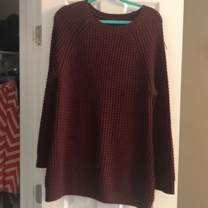 Maroon sweater.